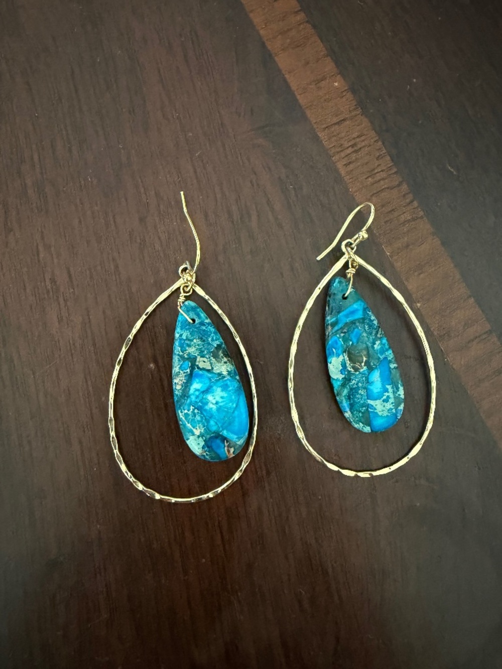 Gold teardrop earrings with teal turquoise stone